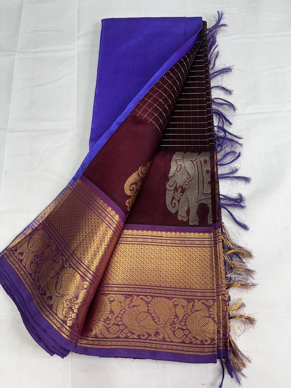 Pure small checked Silk cotton saree in brown with purple korvai zari border