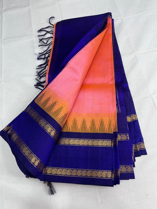 Pure Silk cotton saree in peachish pink with blue zari border
