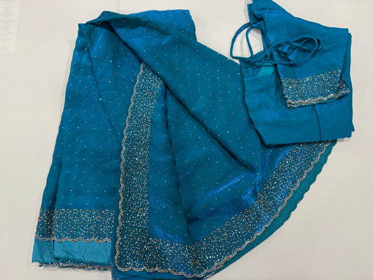 Sold out - Space silk saree in teal green with stitched blouse