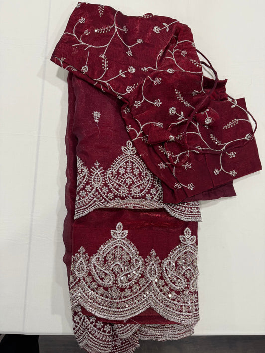 Space silk saree in Maroon with stitched blouse