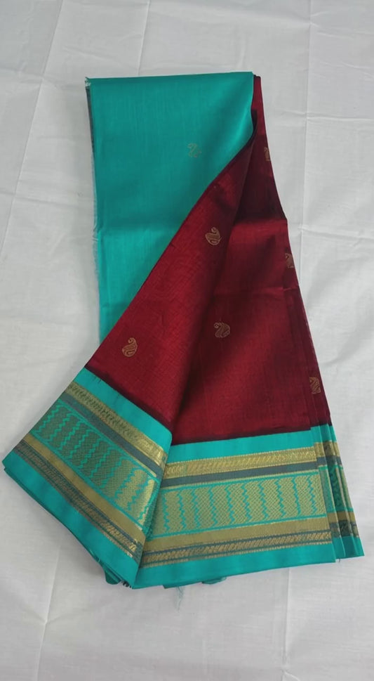 Pure Silk cotton saree in Maroon with teal  korvai zari border
